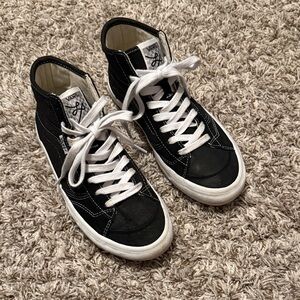 Vans Lizzie Black and White High-Top Sneakers